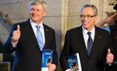 El Primer Ministro Stephen Harper  (izq.) y el Ministro de Hacienda de Canadá, Joe Oliver. Foto: Gob.